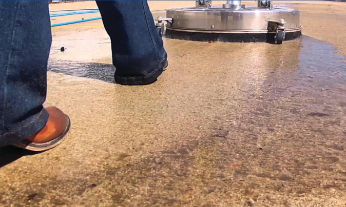 Professional surface cleaner restoring concrete